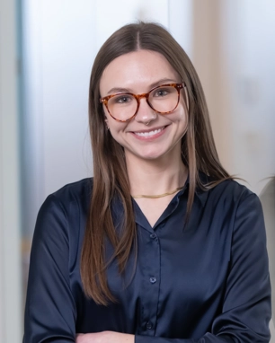 portrait of a smiling person in professional attire